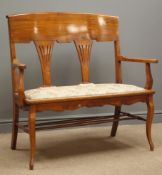 Early 20th century two seat walnut salon settee, pierced splat, upholstered seat,