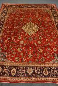 Persian Mahal red ground carpet, floral design, repeating blue ground border,