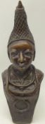 Benin patinated bronze female bust wearing a woven conical headdress and beaded necklaces,