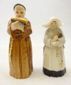 Two Victorian Royal Worcester candle snuffers as a monk standing holding an open Bible date code