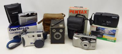 Kodak Six-20 Brownie box camera , Sony DSC-S70 digital camera, Olympus Trip XB400,