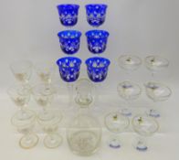 Six 1970s Babycham glasses, six engraved layered blue glass hock glasses,