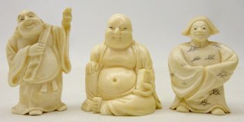 Three Japanese Meiji Period Ivory Netsukes, two modelled as Hotei and another figure in a robe,