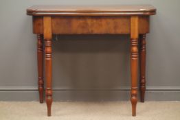 19th century mahogany folding tea table, turned supports, W94cm, H79cm,