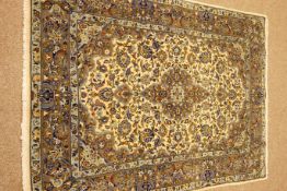 Kashan blue ground rug, central medallion,