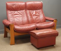 Stressless two seat reclining sofa, (W144cm) and storage stool,
