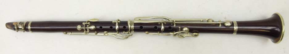 Late 19th Century hardwood clarinet with nickel mounts by Hubert Eugene Vasseilliere,