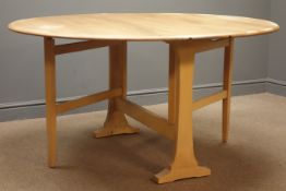 Ercol oval gate action drop leaf dining table, solid end supports on sledge feet, 128cm x 140cm,