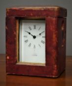 Early 20th century brass carriage clock in leather travelling case