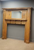 Large early 20th century inlaid oak fire surround, projecting cornice,