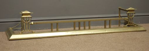 20th century brass fire fender decorated with swags,