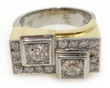 18ct white and yellow gold diamond geometric ring, set with two old cut diamonds of approx 1 carat,