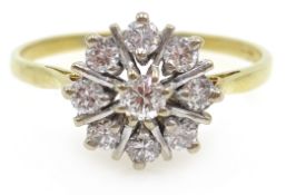 Diamond cluster gold ring stamped 18ct Condition Report ring size T