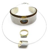 Antoniou designer silver, 18ct gold and aquamarine bangle,