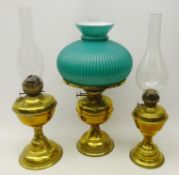 Three brass oil lamps,