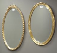 Ornate oval gilt framed bevel edge mirror, (W44cm,