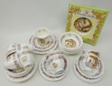 Royal Doulton 'Brambly Hedge Winter' teaware comprising eight trios, tea spare tea plates,