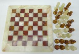 Onyx and marble chess set with board,