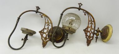 Pair Victorian gilt metal single branch gas wall lights with with pierced foliate arm,