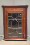 Edwardian inlaid mahogany corner cupboard, projecting cornice,