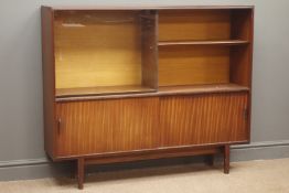 Mid to late 20th century teak bookcase with sliding glass door, adjustable shelves,