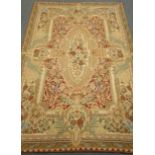 Kasmiri beige ground wool chain hand stitched rug, repeating border,