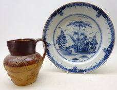 19th/ early 20th century tin glazed circular dish, decorated with a garden landscape, D34.