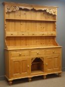 Solid pine dresser projecting cornice, shaped and pierced frieze, two shelves, five small drawers,