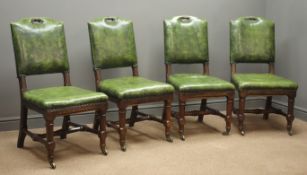 Set four Edwardian oak dining chairs, studded and upholstered in dark green leather,