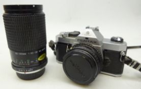 Pentax MX SLR camera with lens and a Cosina 80-200mm 1:45-56 MC Macro lens