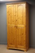 Pine double wardrobe, projecting cornice,