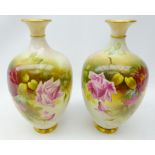 Pair Royal Worcester baluster vases, painted with roses amongst foliage by J.