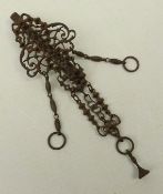 Early 19th century cut steel chatelaine,