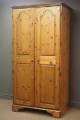Pine double wardrobe, projecting cornice, two panelled doors, fitted interior, W100cm, H192cm,
