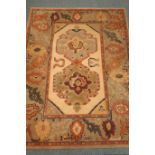 Turkish style rug, beige ground, (194cm x 144cm) and a chinese style rug, light green ground,