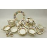 Paragon 'Country Lane' dinner and tea ware decorated with floral and gilt borders on white ground,