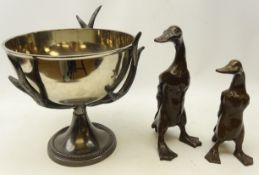 Large silver-plated punch bowl supported by three pewter stag antlers and circular footed base,