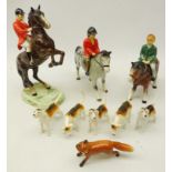 Beswick hunting group comprising Huntsman on rearing horse no.