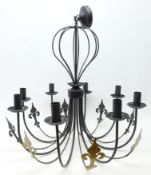 Modern black painted wrought iron eight light electrolier,