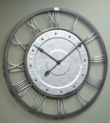 Large metal framed circular wall clock with stainless steel numerals, battery movement,