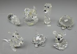 Seven Swarovski crystal animals, two graduating Tortoise, Elephant, Rhinoceros, Dog,