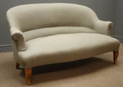 Early 20th century French settee, upholstered in beige fabric, beech shaped supports,