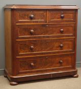 Victorian mahogany chest of two short and three long figured panel drawers with turned wooden