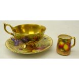 Miniature Royal Worcester jug hand painted with fruit, signed E.