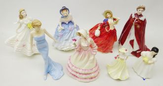 Four Royal Doulton figures 'Alice', 'Diana Princess of Wales', 'Autumn Breezes' and 'Mandy',