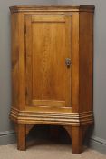 19th century oak and elm floor standing corner cupboard, panelled door enclosing two shelves,