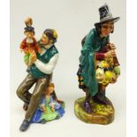 Two Royal Doulton figures comprising 'The Puppetmaker' HN2103 and 'The Mask Seller' HN2253,