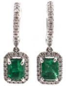 Pair of 18ct white gold emerald and diamond pendant ear-rings,