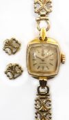 Omega ladies 18ct gold wristwatch on 9ct gold bracelet stamped 750 with two spare links