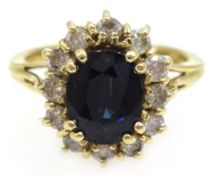 Sapphire and diamond cluster ring stamped 14k